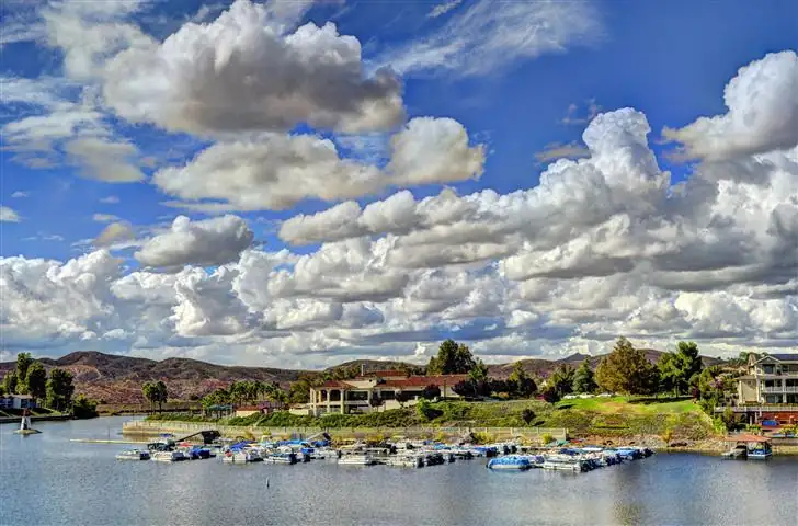 The Canyon Lake Lodge, lighthouse and marina on the water in Canyon Lake, California